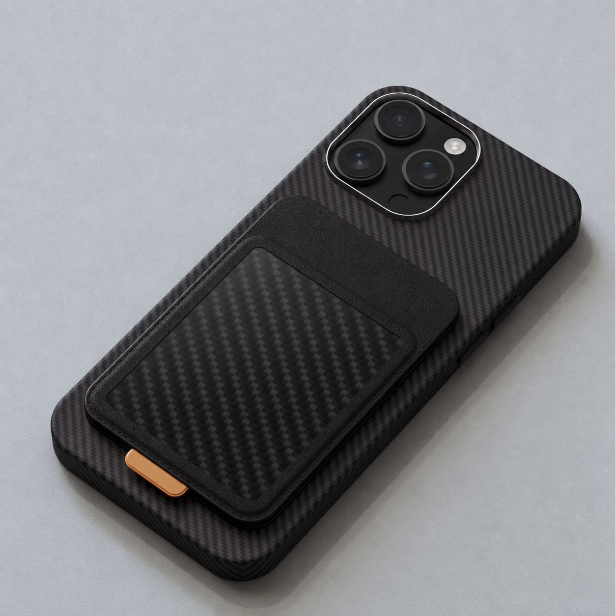 Black magnetic carbon fiber card wallet stand attached to an iPhone case